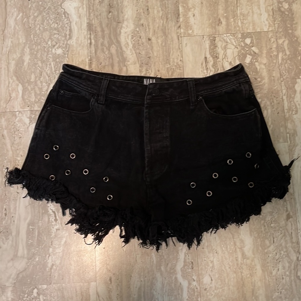 Frayed hi rise shorts with eyelet cut outs